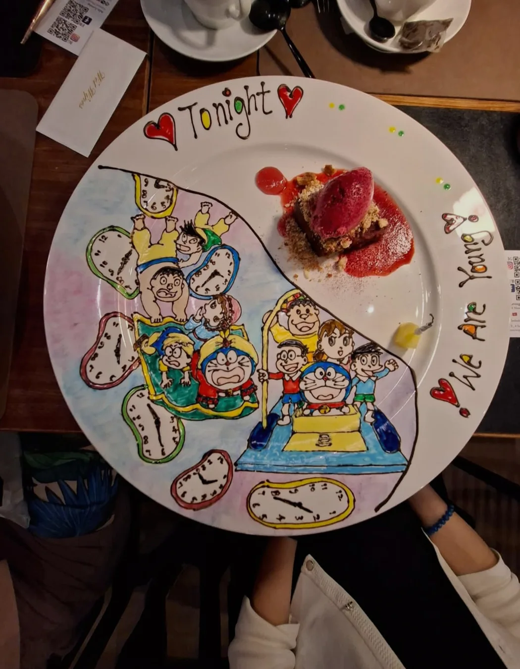 A hand-drawn Doraemon celebration plate
